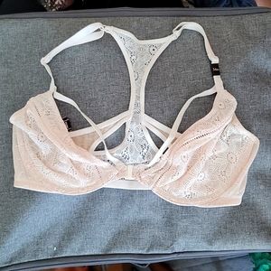 34D unpadded bra. Cream colored